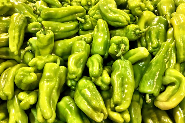 An abundance of pepperoncini peppers.