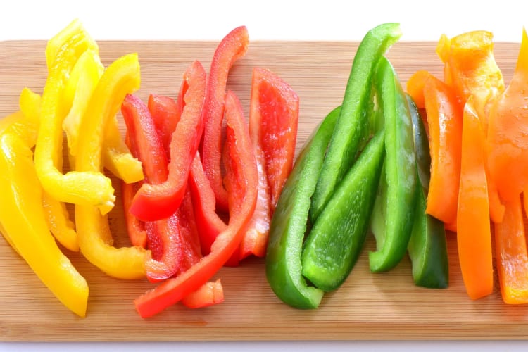 Sliced sweet peppers, ready to be used in a salad.