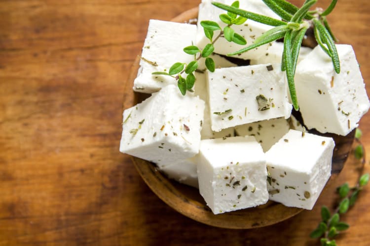 Feta cheese goes great with sweet peppers in a salad.