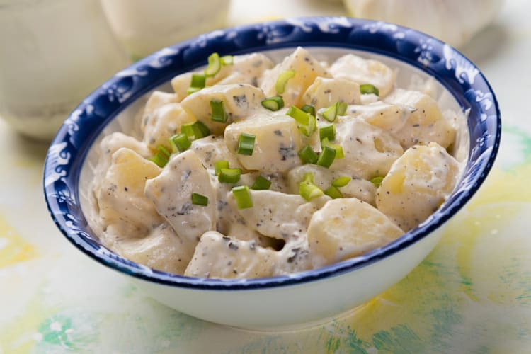 Potato salad with mayonnaise dressing in a bowl