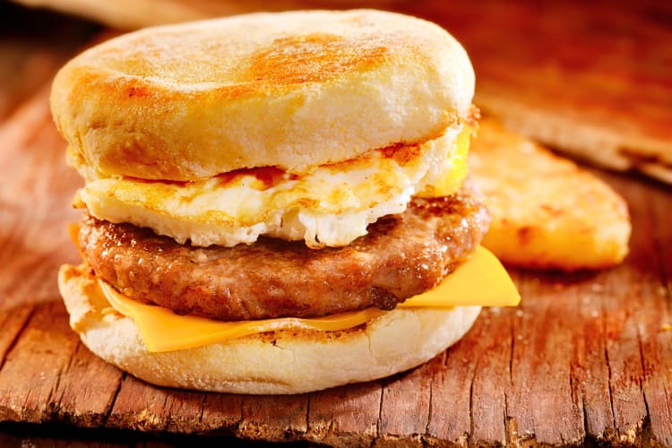 Breakfast sandwich with sausage, egg and cheese
