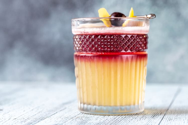A New York sour is a whiskey cocktail combined with red wine