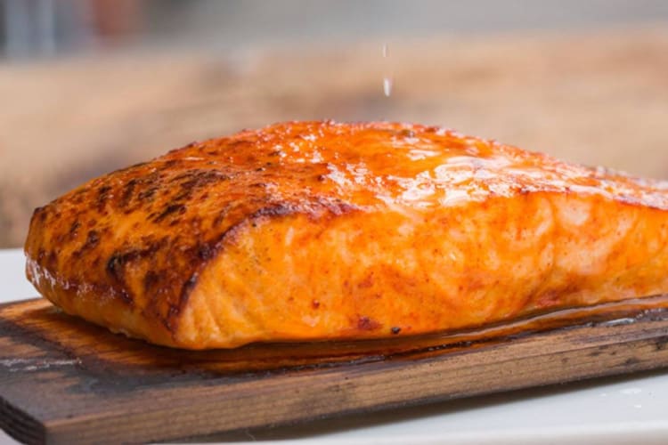 A Whole30 fast food choice is the Cedar Plank Salmon with fresh lime.