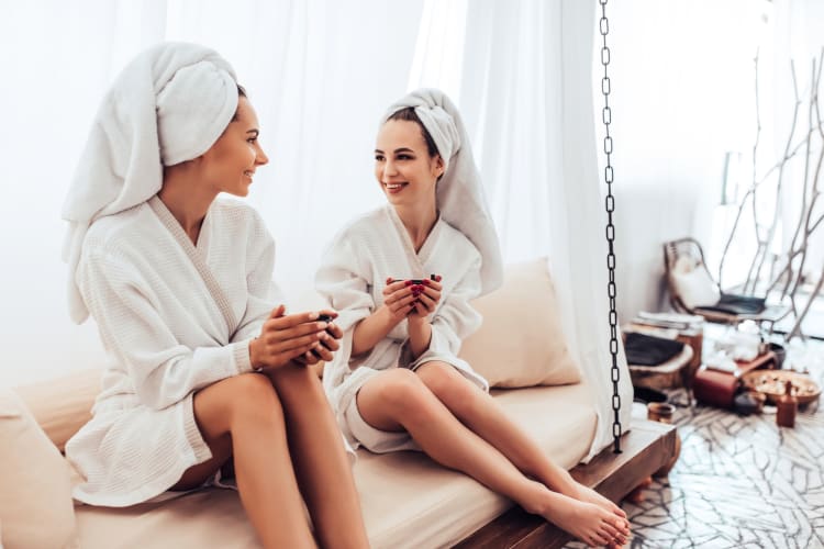 Two women in bathrobes at the spa