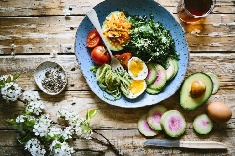 a plate filled with healthy fats
