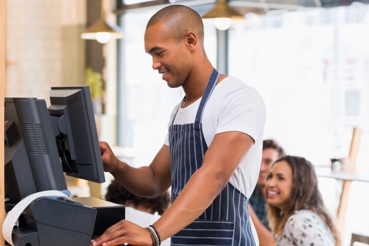 Waiter processing orders