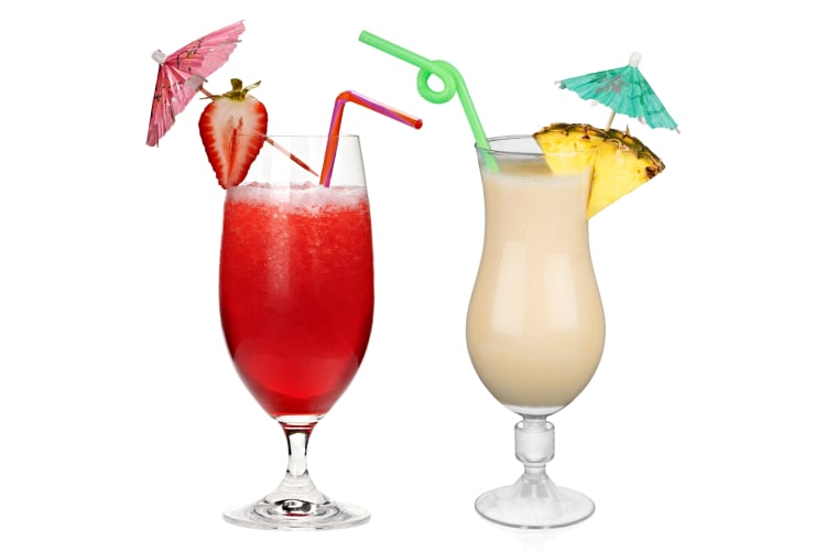 Strawberry daiquiri and piña colada drinks