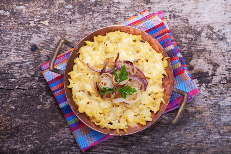 Aerial view of käsespätzle — a tasty Austrian food similar to mac and cheese