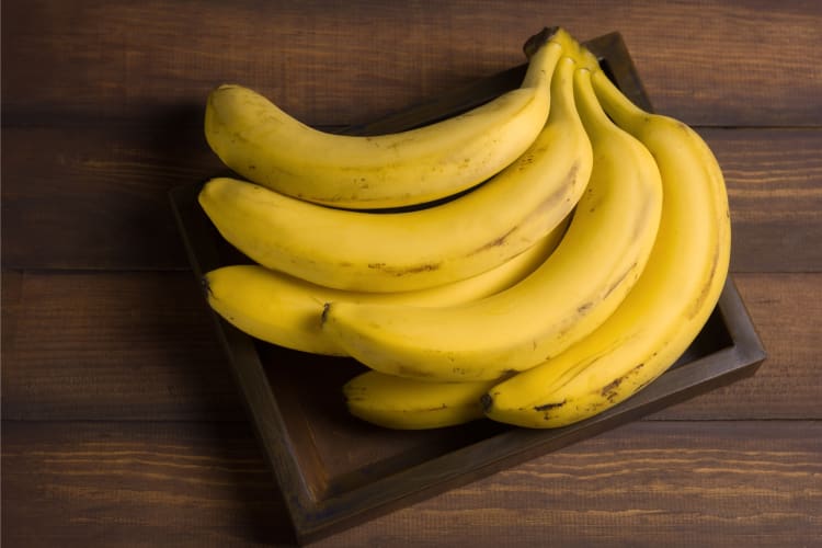 Bananas on a wooden surface
