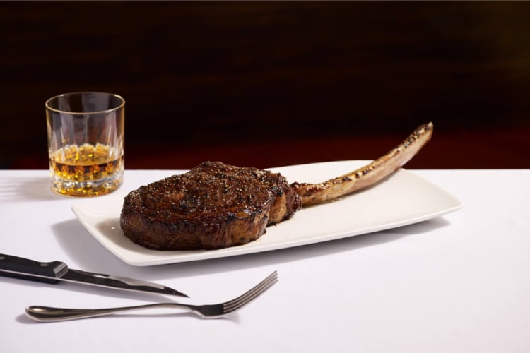 A steak on the bone served at Sullivan's Steakhouse