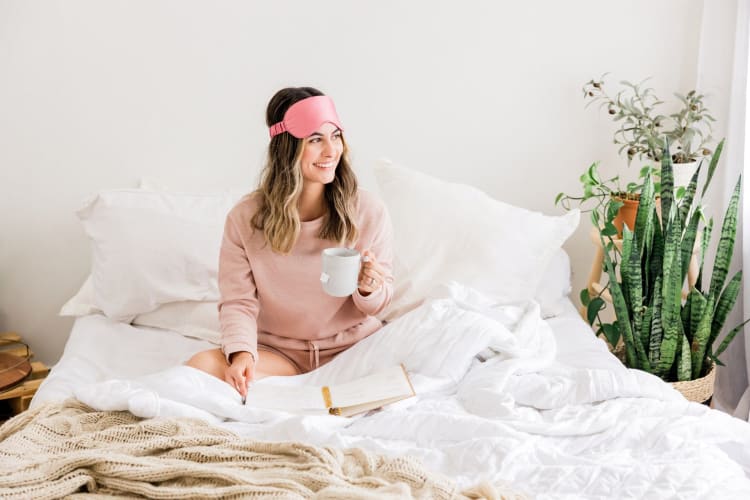 Drinking tea in bed.