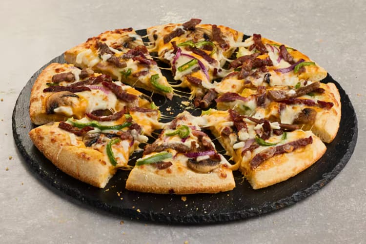 The Philly Cheese Steak is one of the best Domino's pizzas for those who like steak, mushrooms, onions and green peppers