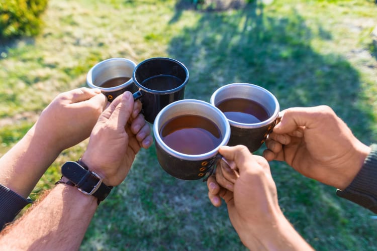 Cups of tea made with the best ginger tea brands.