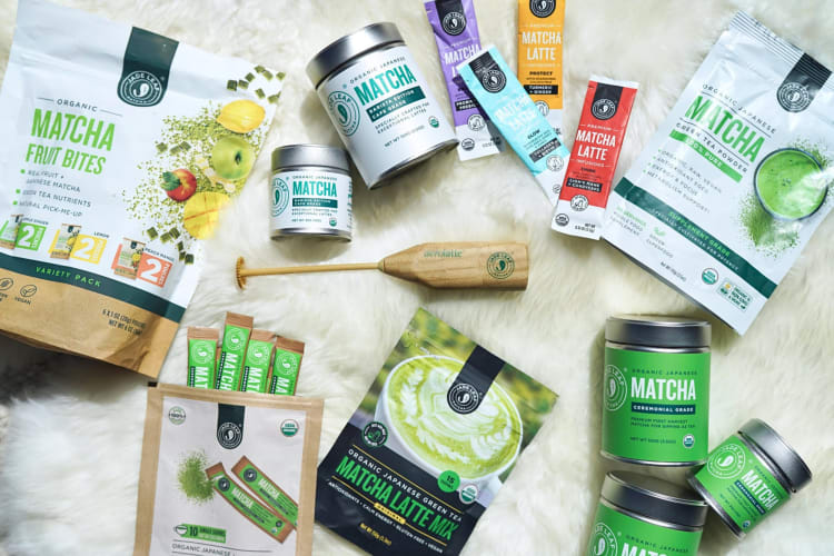Various Jade Leaf matcha products on a fluffy blanket