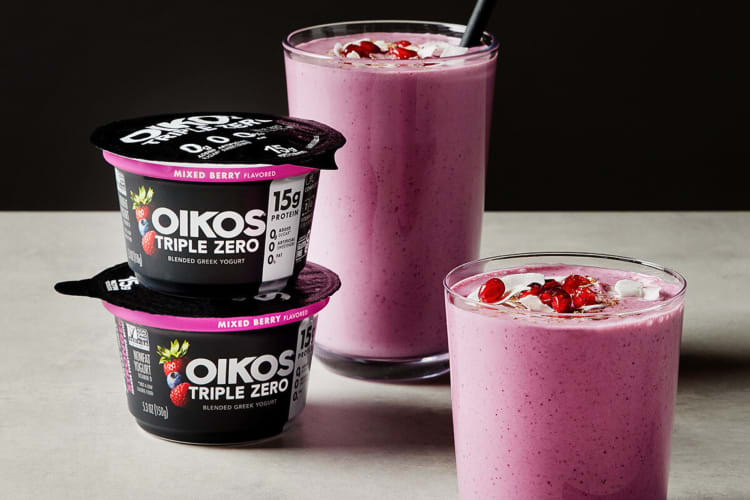 Two Oikos Triple Zero Yogurts and two pink smoothies