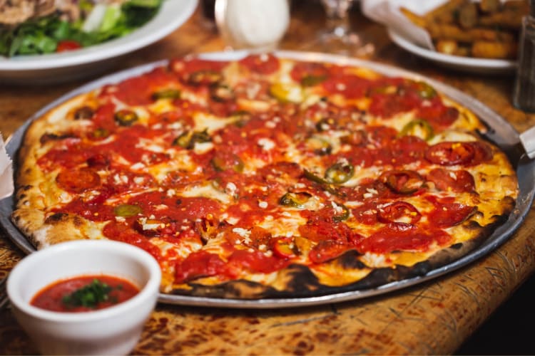 Iconic John's of Bleecker Street serves some of the best pizza in Manhattan.