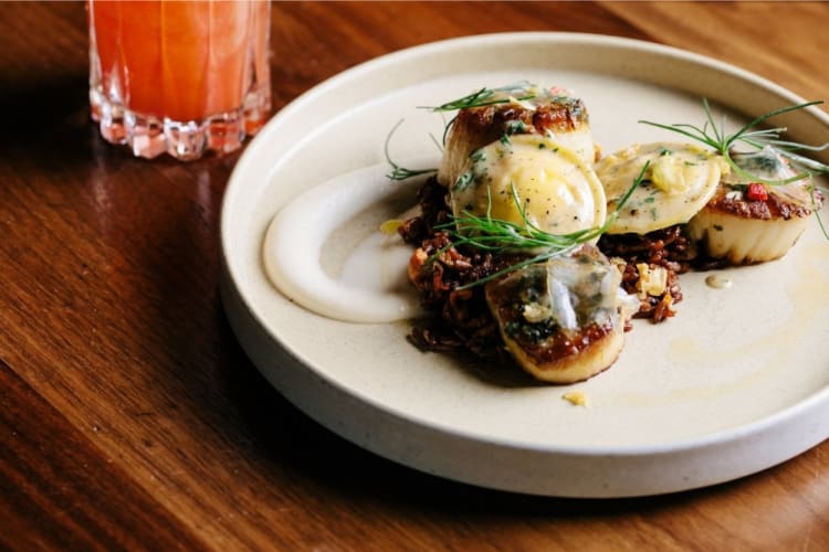A plate of seafood is served at Fat Ox