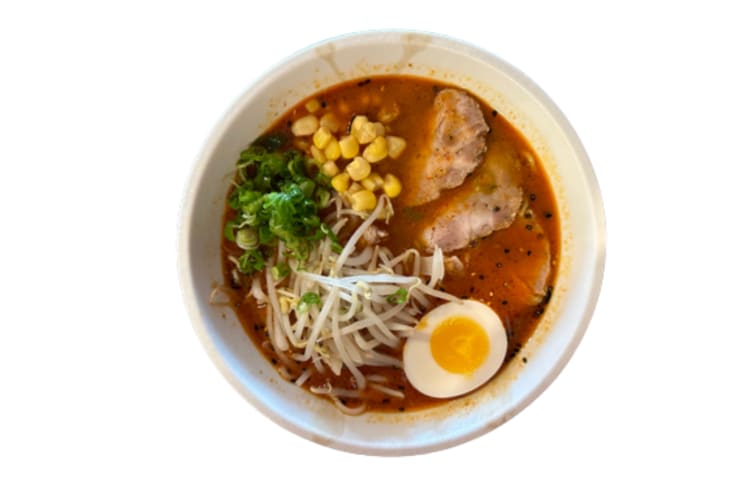 Spicy miso ramen served with broth, sliced ground pork stir-fry, chashu and a soft-boiled egg