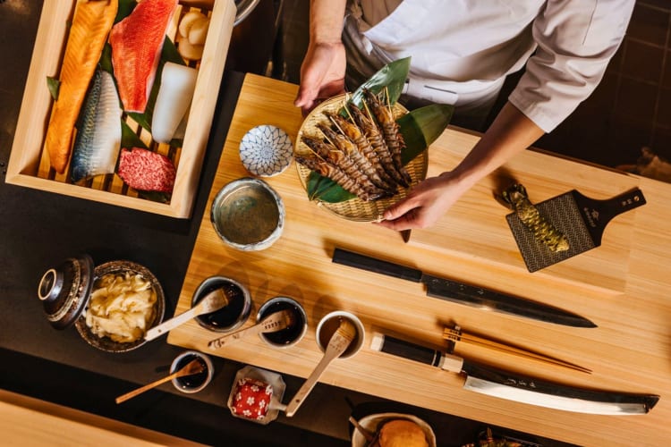 A chef preparing sushi.