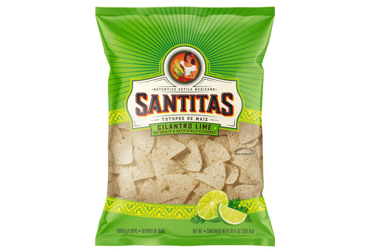 A lime green bag of Santitas tortilla chips