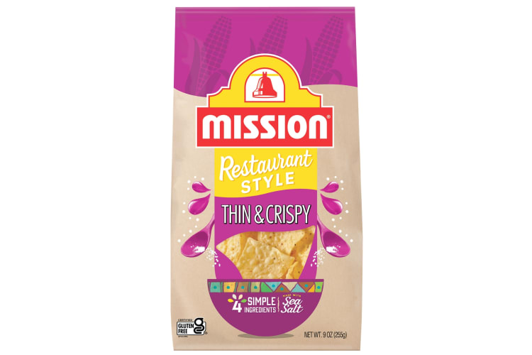 A pink bag of Mission restaurant-style tortilla chips