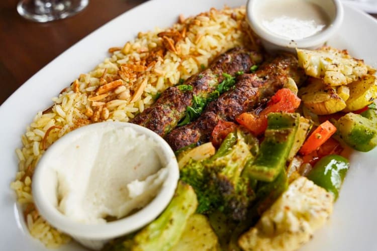 Chicken kafta served with rice and vegetables