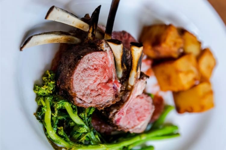 a perfectly cooked rack of lamb is perfect to celebrate a birthday dinner in Pittsburgh