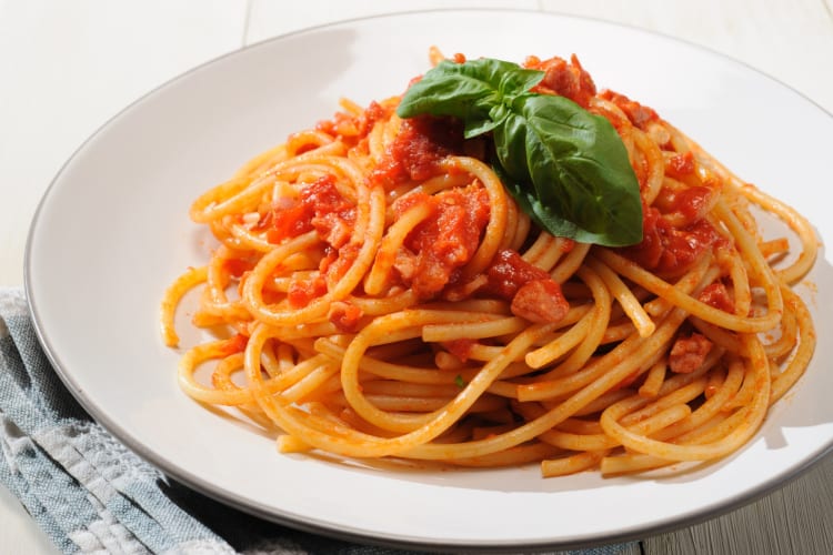 Bucatini all’amatriciana served with basil