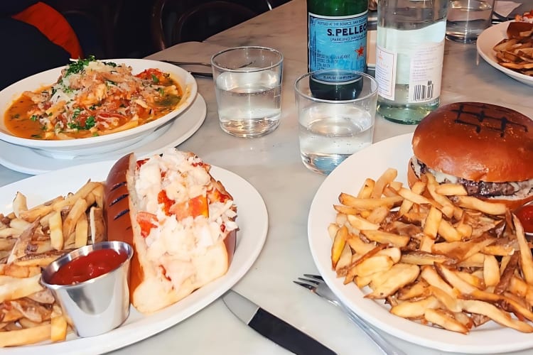 The Neptune burger and the Maine lobster roll are fan-favorites at this birthday restaurant in Boston