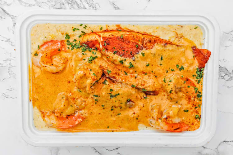 Salmon fillet, paired with creamy grits