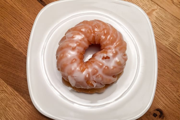 Glazed cruller donut on a plate