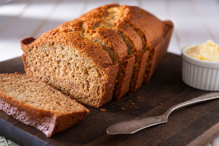 loaf of banana bread on a serving platter