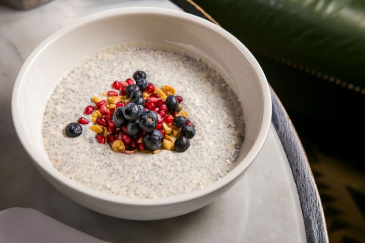 Classic oatmeal served with seasonal berries