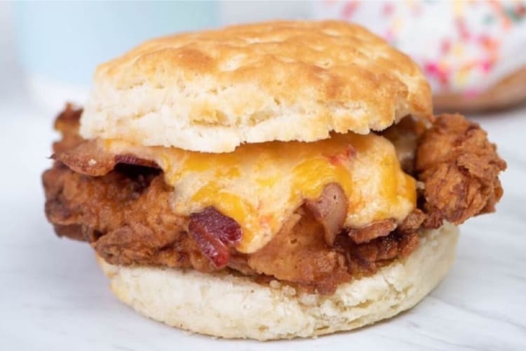 A biscuit filled with fried chicken and cheese