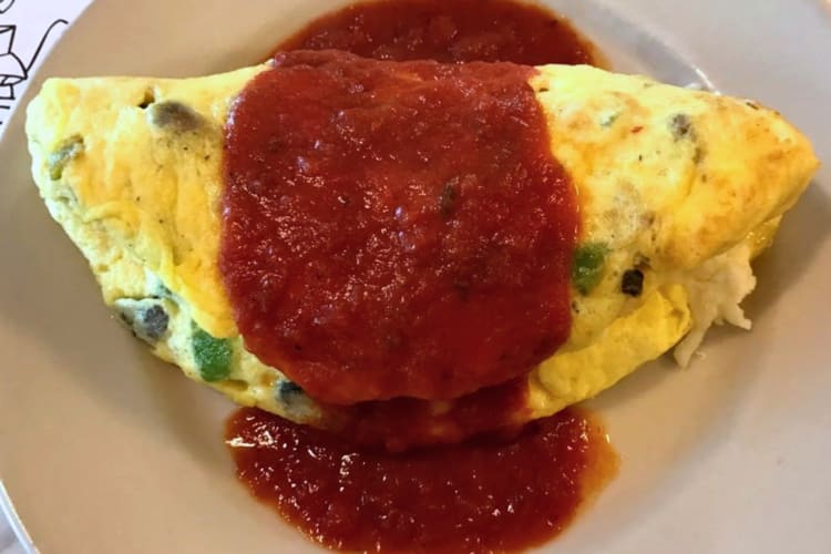 Omelete made with Pinto beans, avocado, jack cheese and roasted salsa.