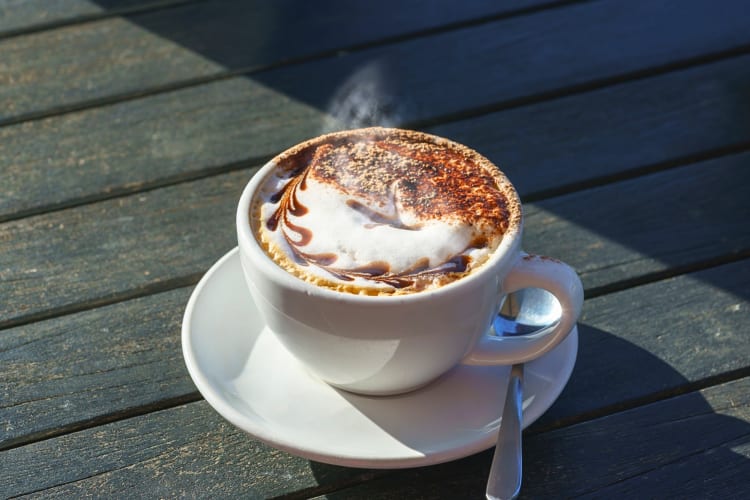 Hot caffé mocha on a wooden table