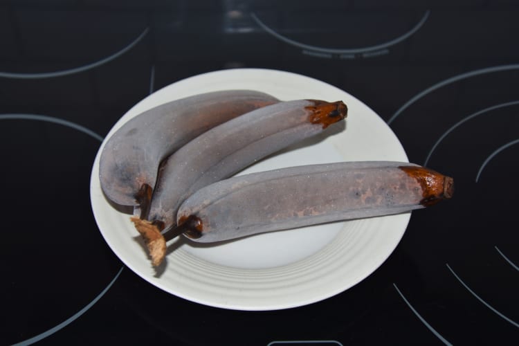 Frozen ripe bananas on a plate