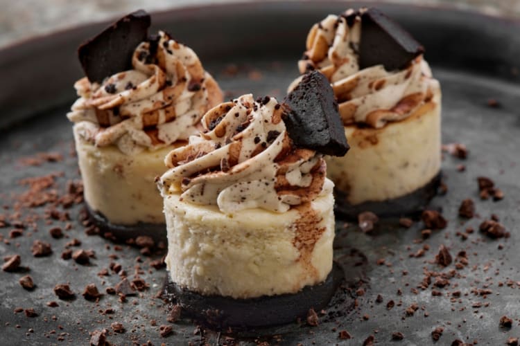 Three small chocolate cheesecakes