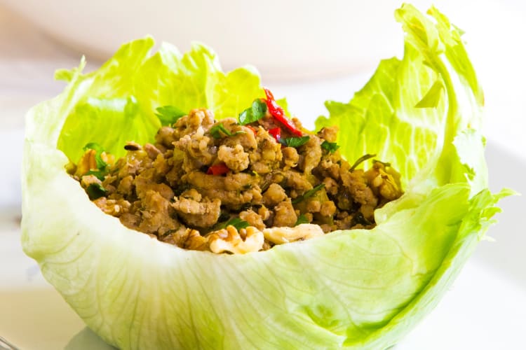 Chicken larb served on lettuce