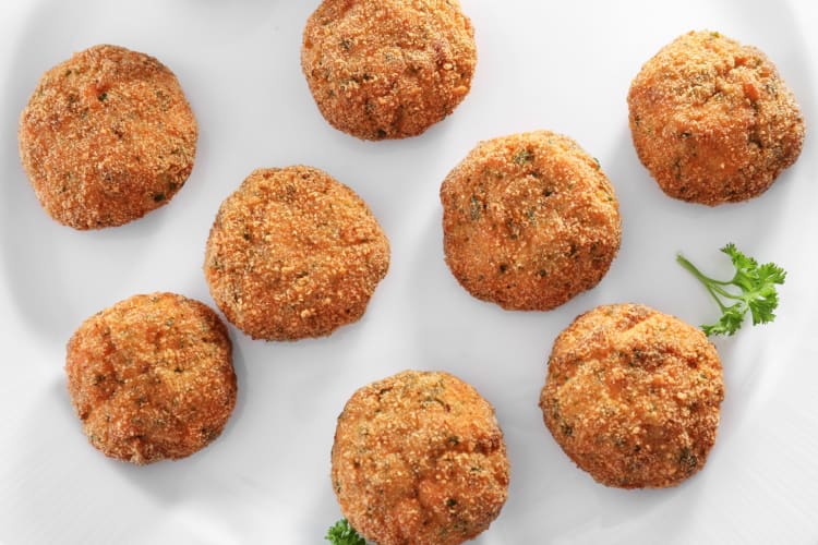 Salmon patties served on a plate