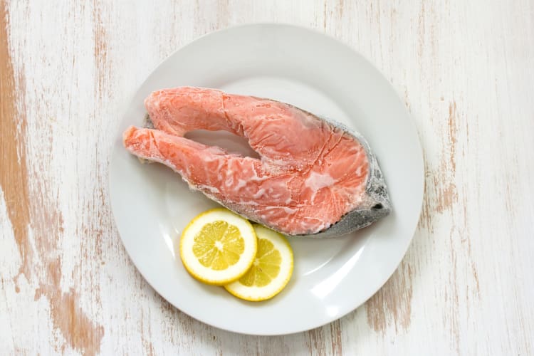 Frozen fresh salmon with lime