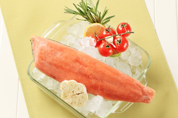 Salmon on top of ice cubes