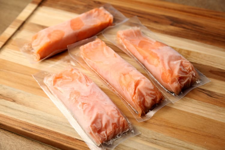 Frozen salmon on plastic bags