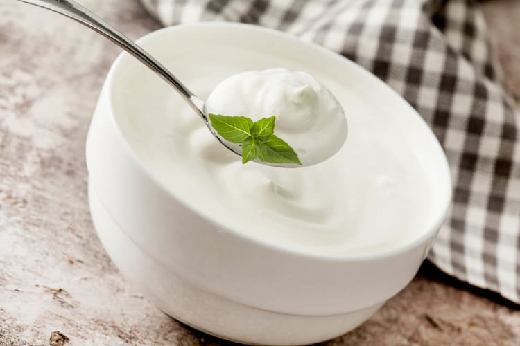 You can freeze yogurt and thaw it in the fridge