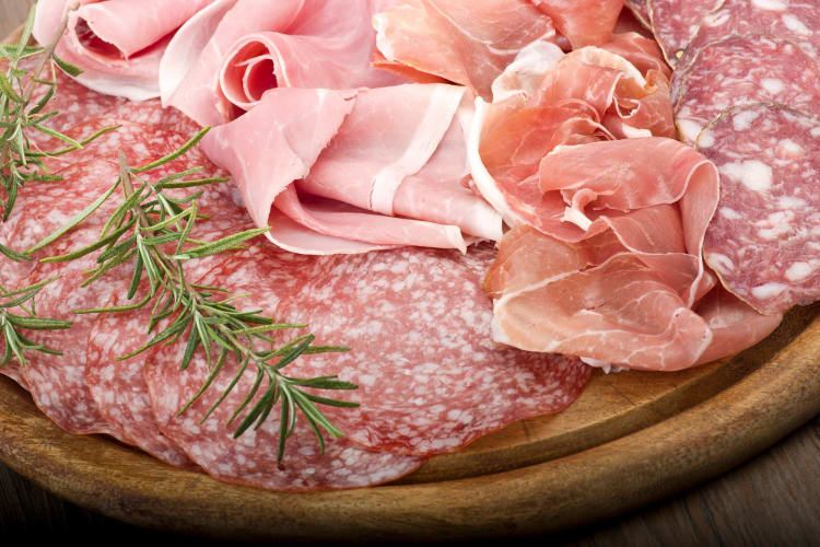 Salami and cured-meats on a charcuterie board