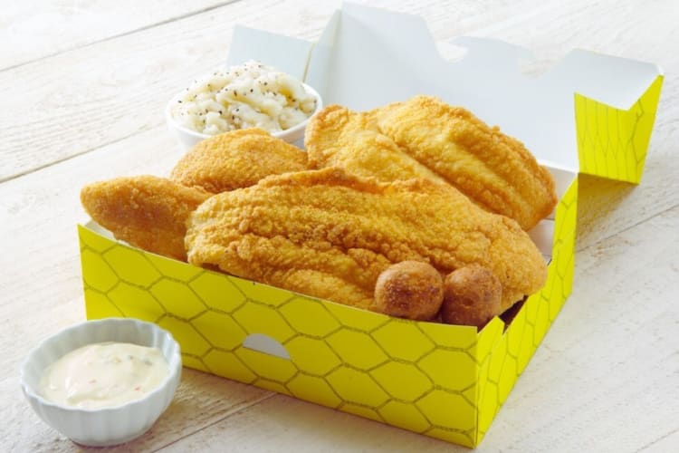 Fish tender combo served with mashed potatoes and sauce