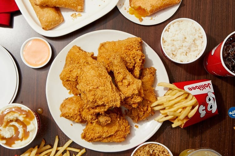 Chicken pieces and various sides from Jollibee, a popular chicken fast food chain