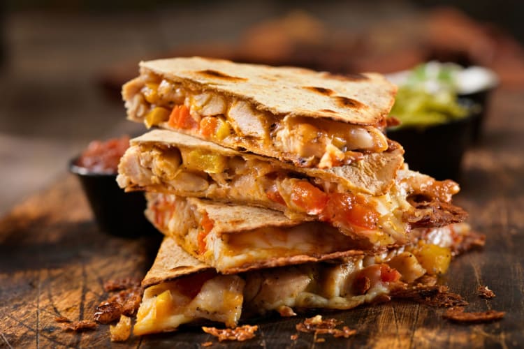 This popular secret menu item consists of a burrito encased in a deliciously cheesy quesadilla shell.