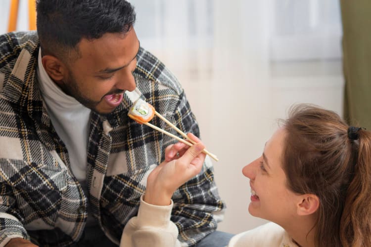 couple eating sushi