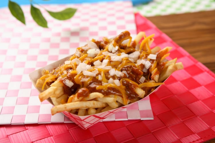 Chili Cheese fries topped with onions